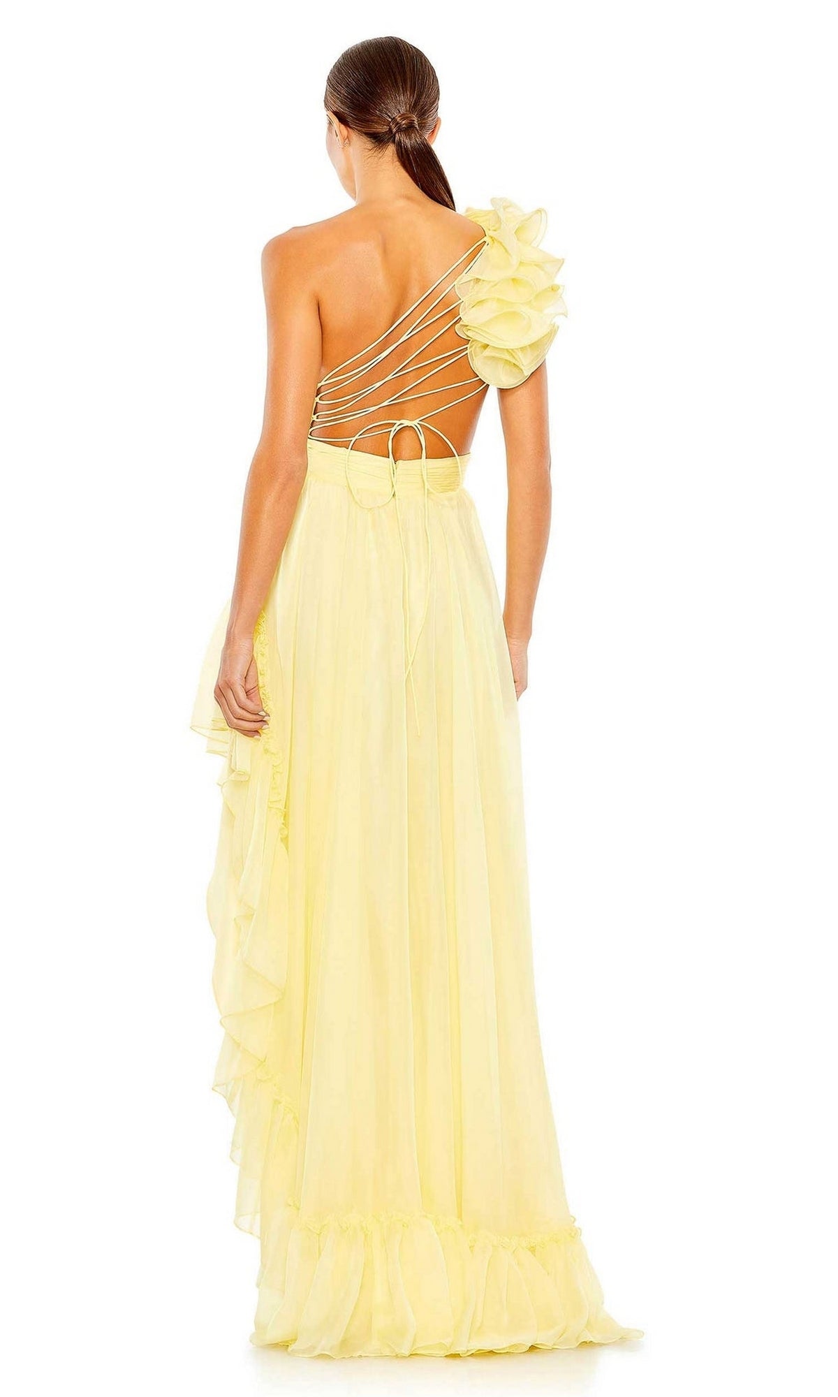 Woman wearing the Long Formal Dress 67989 by Mac Duggal—an asymmetric, tiered light yellow gown with ruffles, open back, and crisscross straps—styled as a one-shoulder formal dress, viewed from behind.